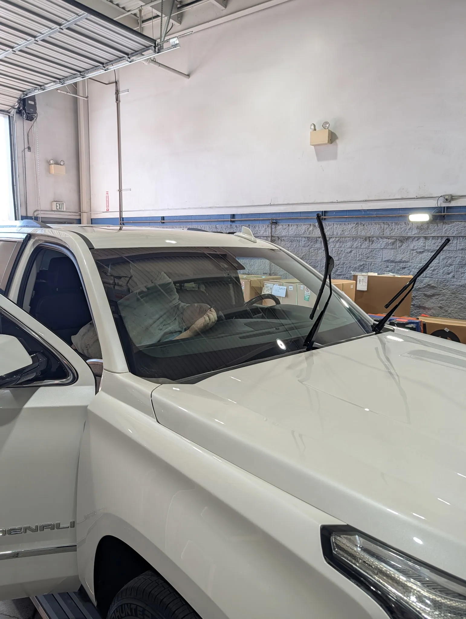 Auto glass install in driveway